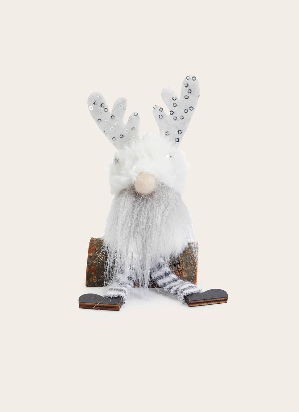 PETIT LUTIN DE NOËL ASSIS SUR UN RONDIN GINGEMBRE