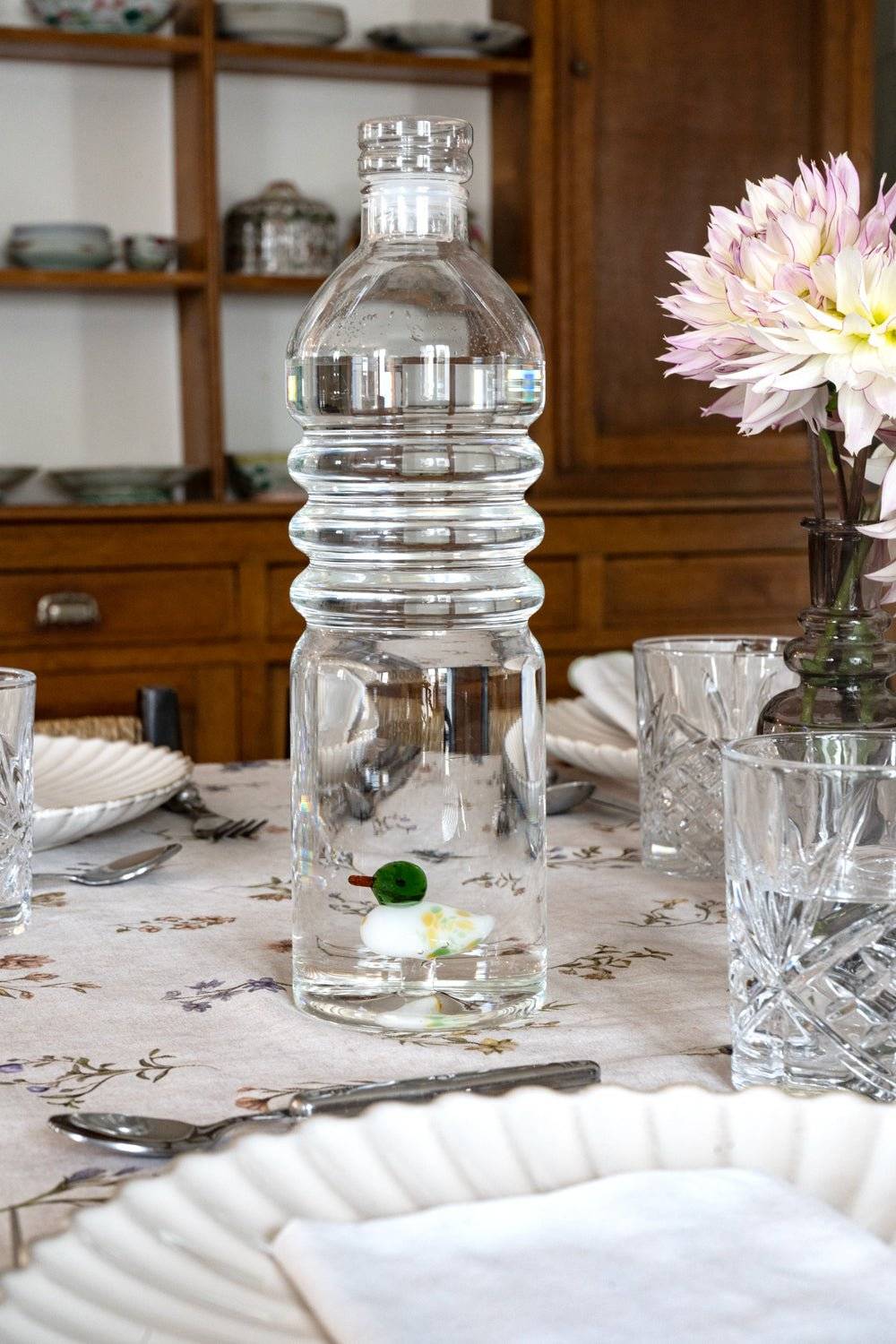 Bouteille en cristal avec figurine de canard